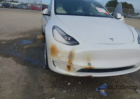 2021 Tesla Model Y Standard Range Rear-Wheel Drive from USA, damaged, VIN 5YJYGDED7MF103408